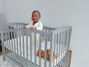 baby in cot - crib sheet set